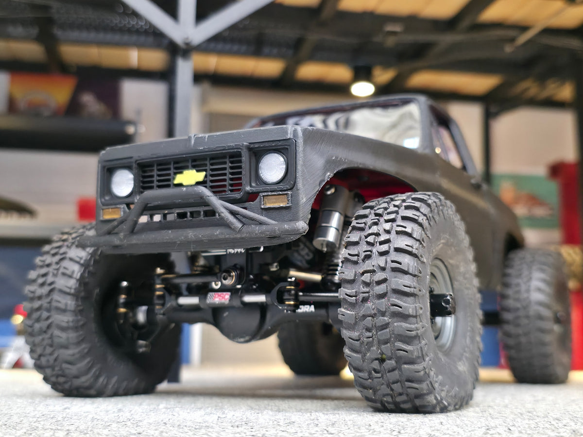 Detailed grille, front bumper and headlight lenses on completed example