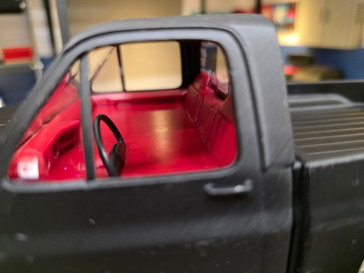 Example of separately painted interior and steering wheel; supplied interior matches selected body color