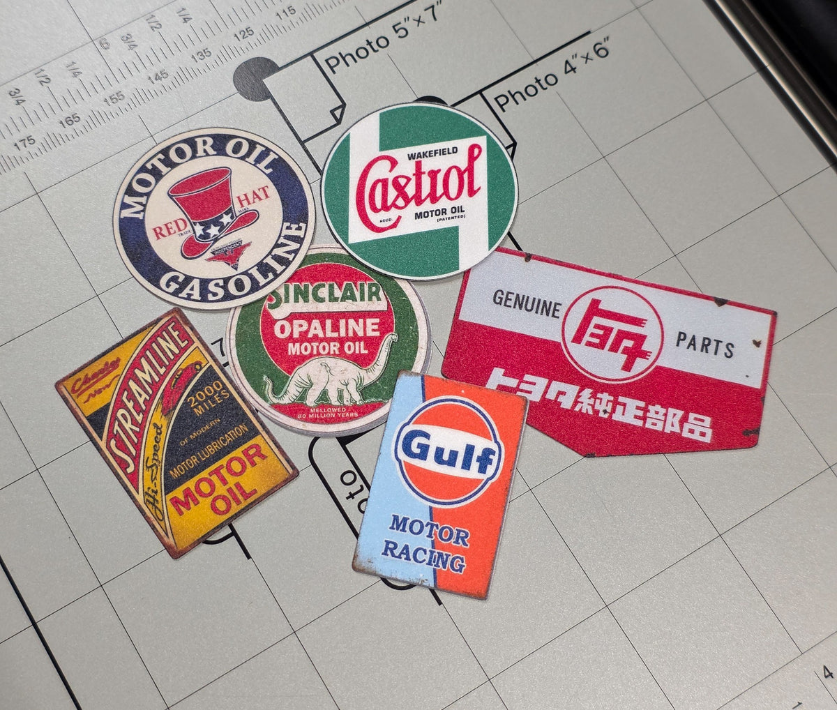 828RC rotating assortment of matte laminated miniature retro garage signs