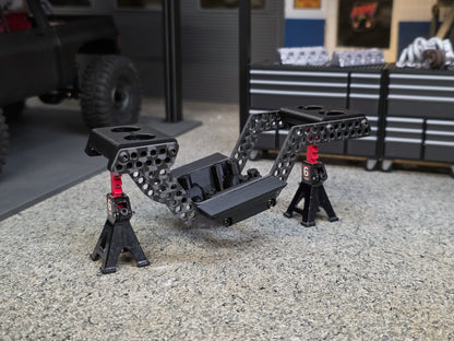 Black carbon King Snake chassis with black printed parts, three-quarter view